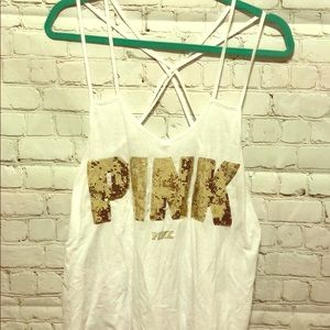 Cross back sequined tank top.
